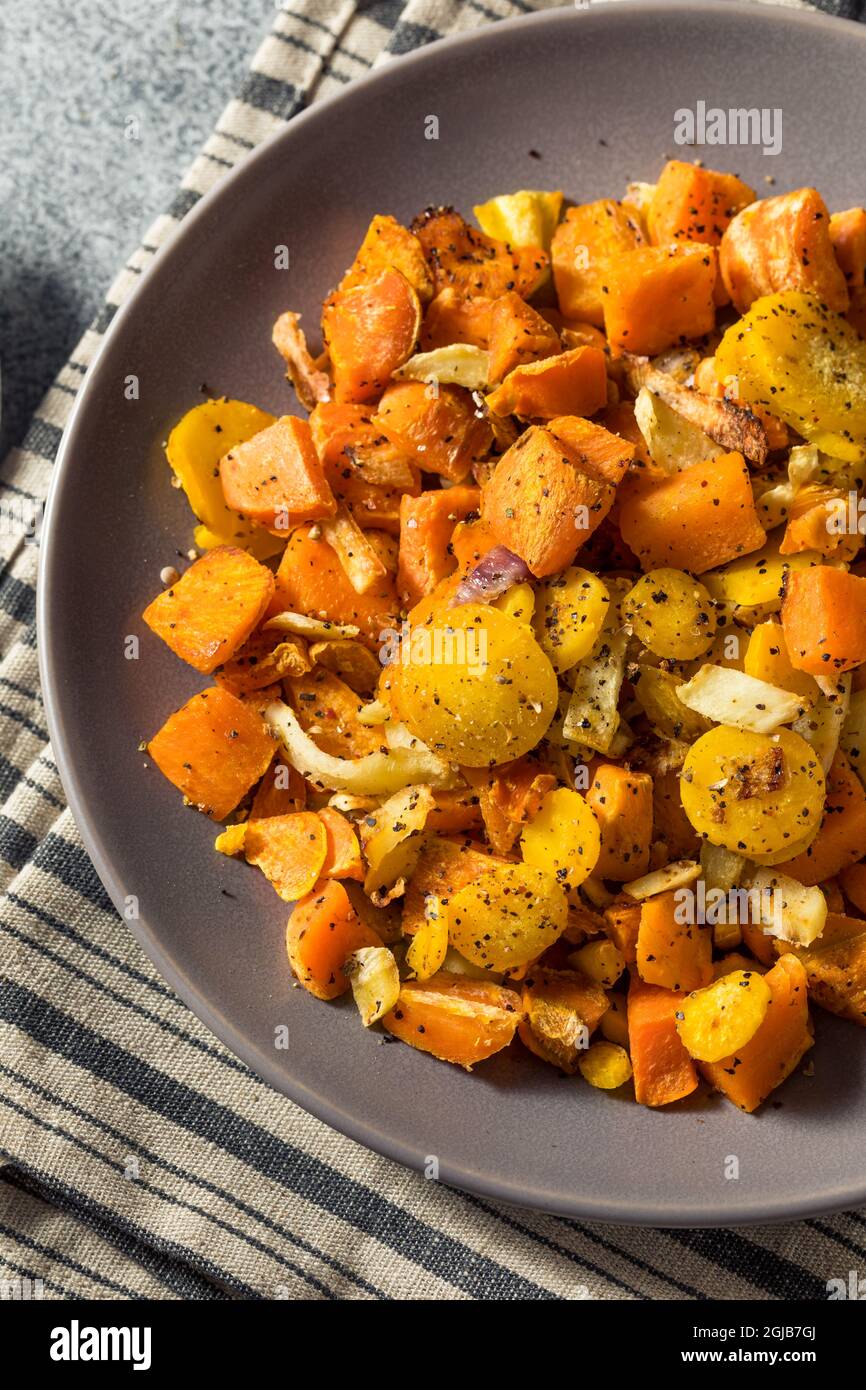 Healthy Roasted Potato Root Vegetables with Parsnips and Carrots Stock Photo