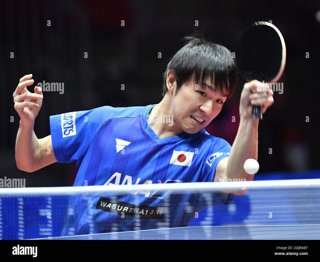 Koki Niwa of Japan in action against Cedric Nuytinck of Belgium during the group C match Belgium - Japan round 1 at the World Team Table Tennis Championships 2018 at Halmstad Arena in Halmstad, Sweden April 29, 2018. Photo: Jonas Ekstromer / TT / kod 10030  Stock Photo