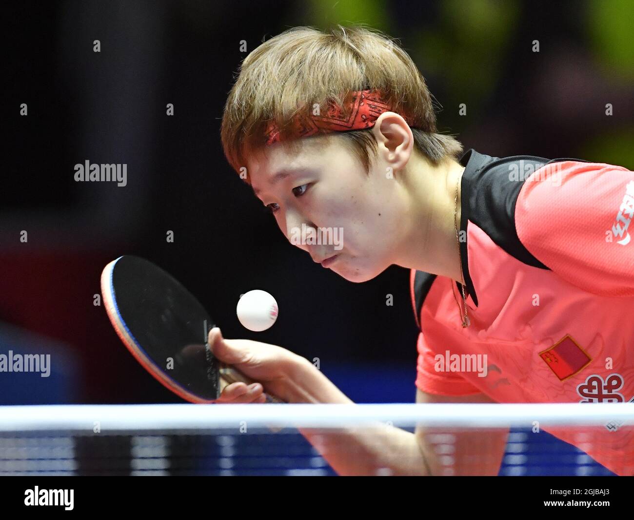 Manyu Wang of China in action during the match against Tianwei Feng of  Singapore during their group A match Singapore vs. China at the World Team Table  Tennis Championships 2018 at Halmstad