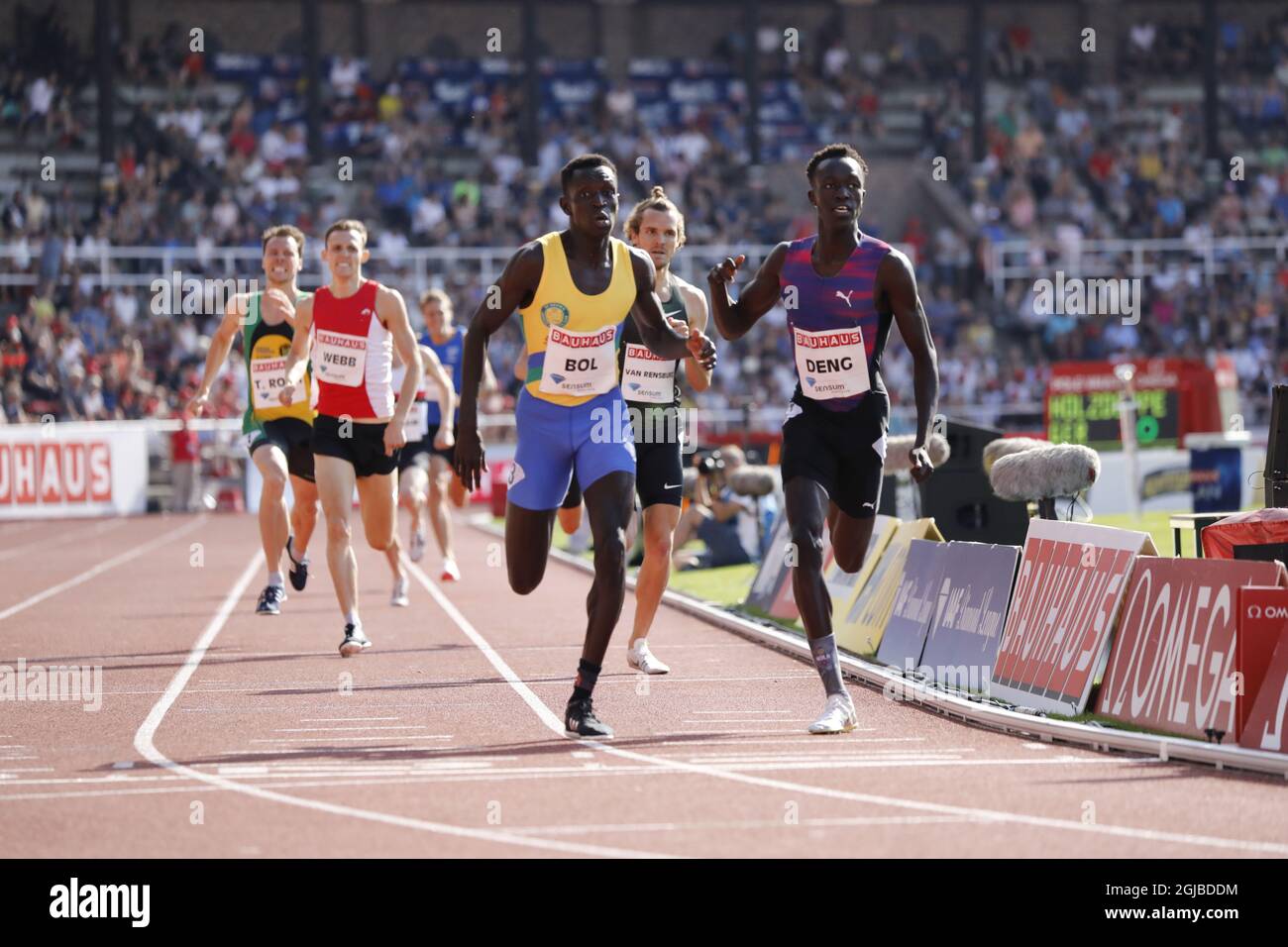 Peter Bol of Australia (L) comptes to win before compatriot Joseph Deng (R) and third placed van Rensburg of South Africa in the men's event at IAAF Diamond League