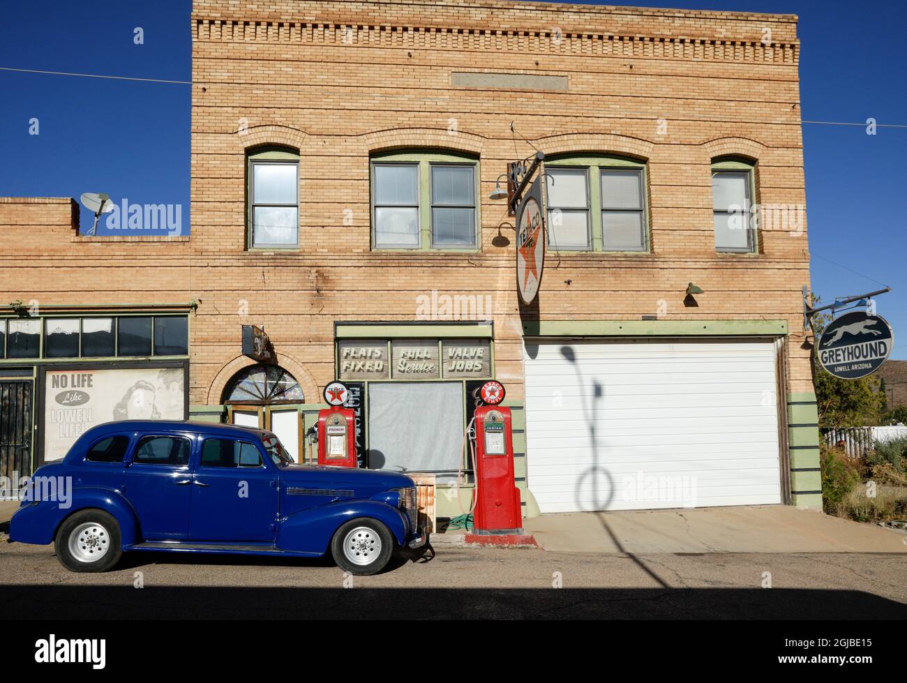 Lowell, Arizona. Old car and gas pumps. (Editorial Use Only Stock Photo