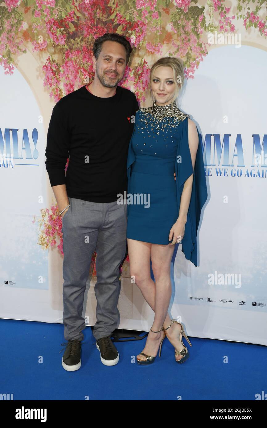Amanda Seyfried And Husband Thomas Sadoski Attending The Premiere Of Mamma Mia Here We Go Again Held At The Eventim Hammersmith Apollo London Photo Credit Should Read Doug Peters Empics Stock Photo