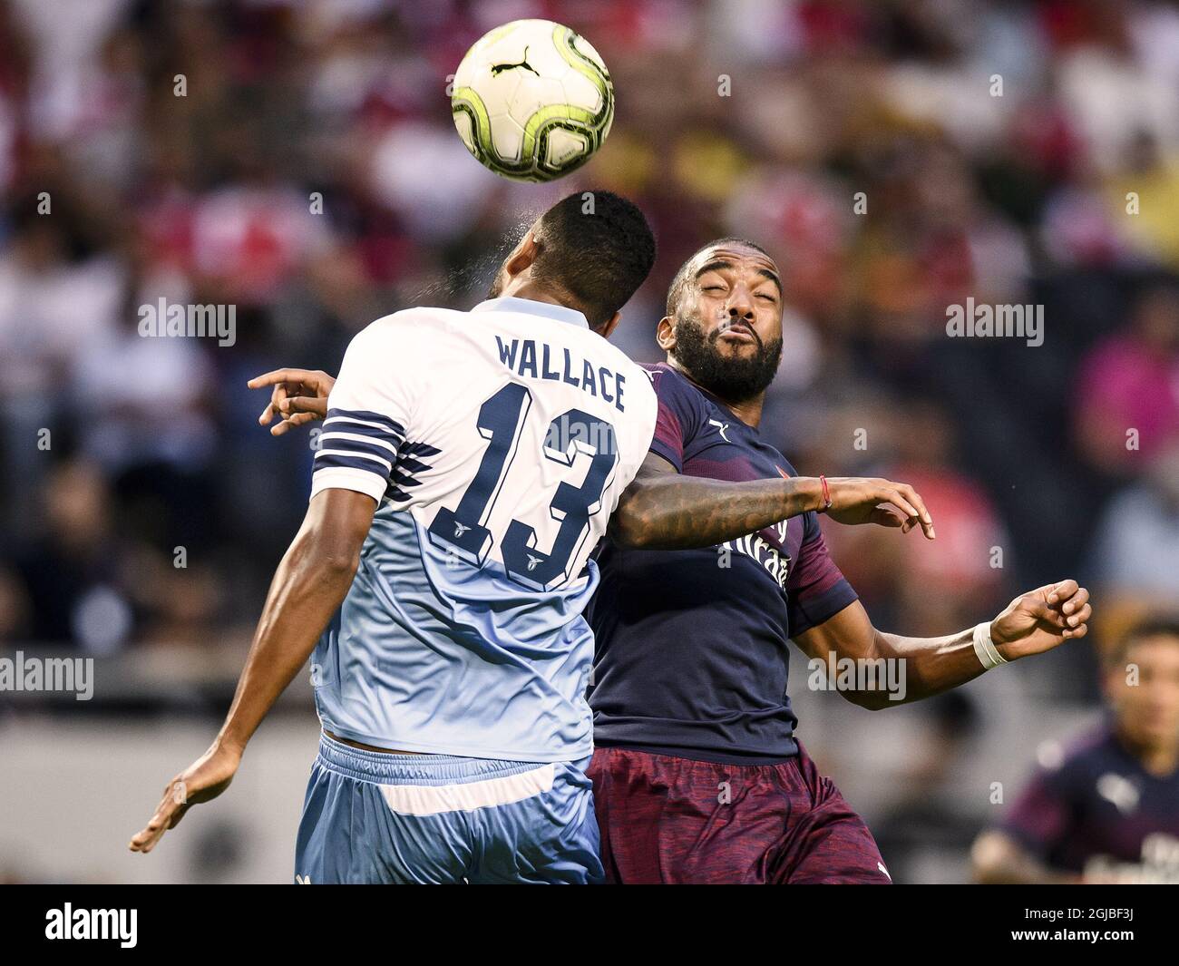 Lazio's Wallace and Arsenal's Alexandre Lacazette fight for the ball during a pre season friendly soccer match between Arsenal FC and SS Lazio at Friends Arena in Solna, Stockholm, Sweden on Aug. 04, 2018. Photo: Erik Simander / TT / code 11720  Stock Photo