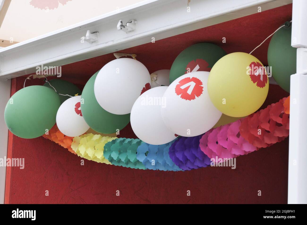 STOCKHOLM 2018-08-14 Balloons of the logotype of the Left party are seen in an election information office in a square in Stockholm, Sweden on Tuesday. Sweden goes to the ballots in a general election September 9. Photo Leif Blom / TT Code 50080  Stock Photo