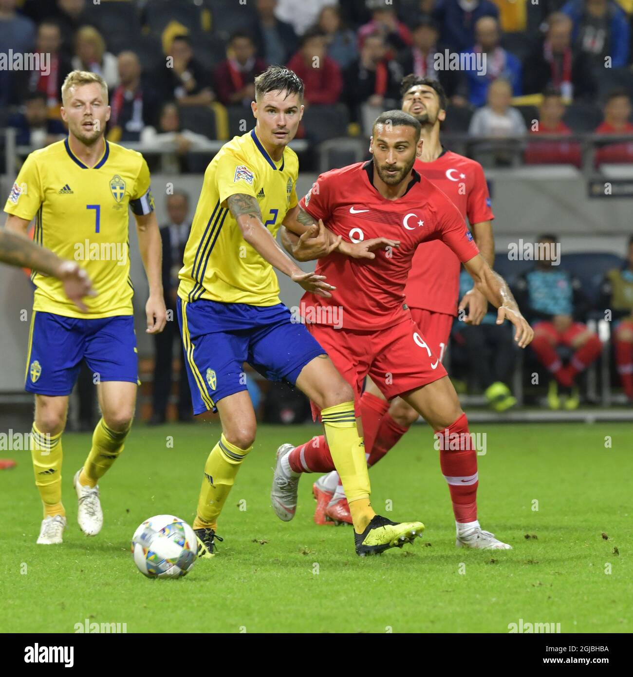 Sweden's Mikael Lustig (2) fights for the ball with Turkey's Cenk Tosun during the UEFA Nations League, league B, group 2, soccer match between Sweden and Turkey at Friends Arena in Solna, Stockholm, Sweden, on Sept. 10, 2018. Photo: Jonas Ekstromer / TT / code 10030  Stock Photo