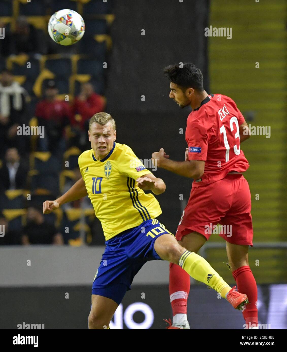 Sweden's Viktor Claesson (C) fights for the ball with Turkey's Zeki Celik during the UEFA Nations League, league B, group 2, soccer match between Sweden and Turkey at Friends Arena in Solna, Stockholm, Sweden, on Sept. 10, 2018. Photo: Jonas Ekstromer / TT / code 10030  Stock Photo