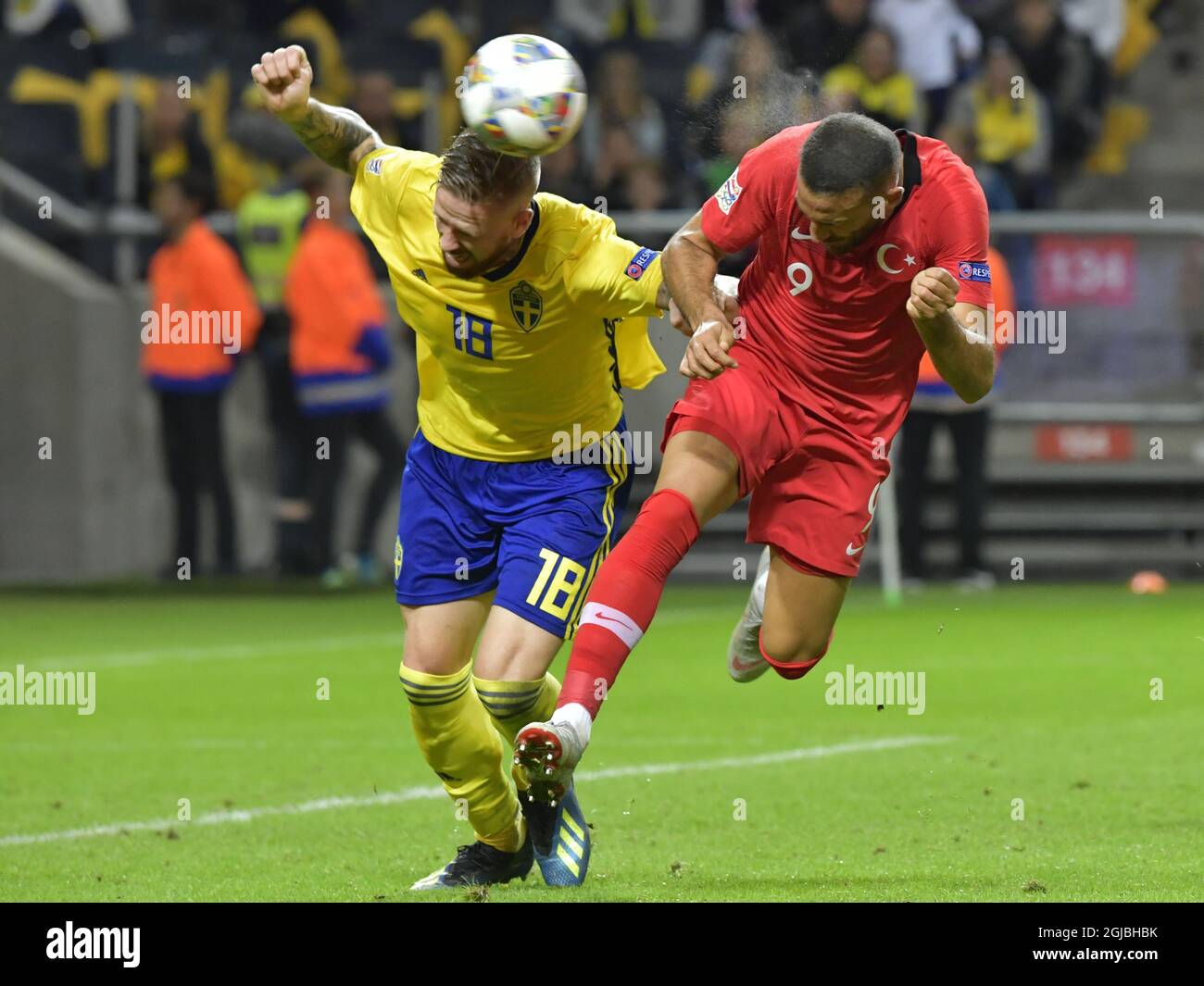Sweden's Pontus Jansson (L) fights for the ball with Turkey's Cenk Tosun during the UEFA Nations League, league B, group 2, soccer match between Sweden and Turkey at Friends Arena in Solna, Stockholm, Sweden, on Sept. 10, 2018. Photo: Jonas Ekstromer / TT / code 10030  Stock Photo