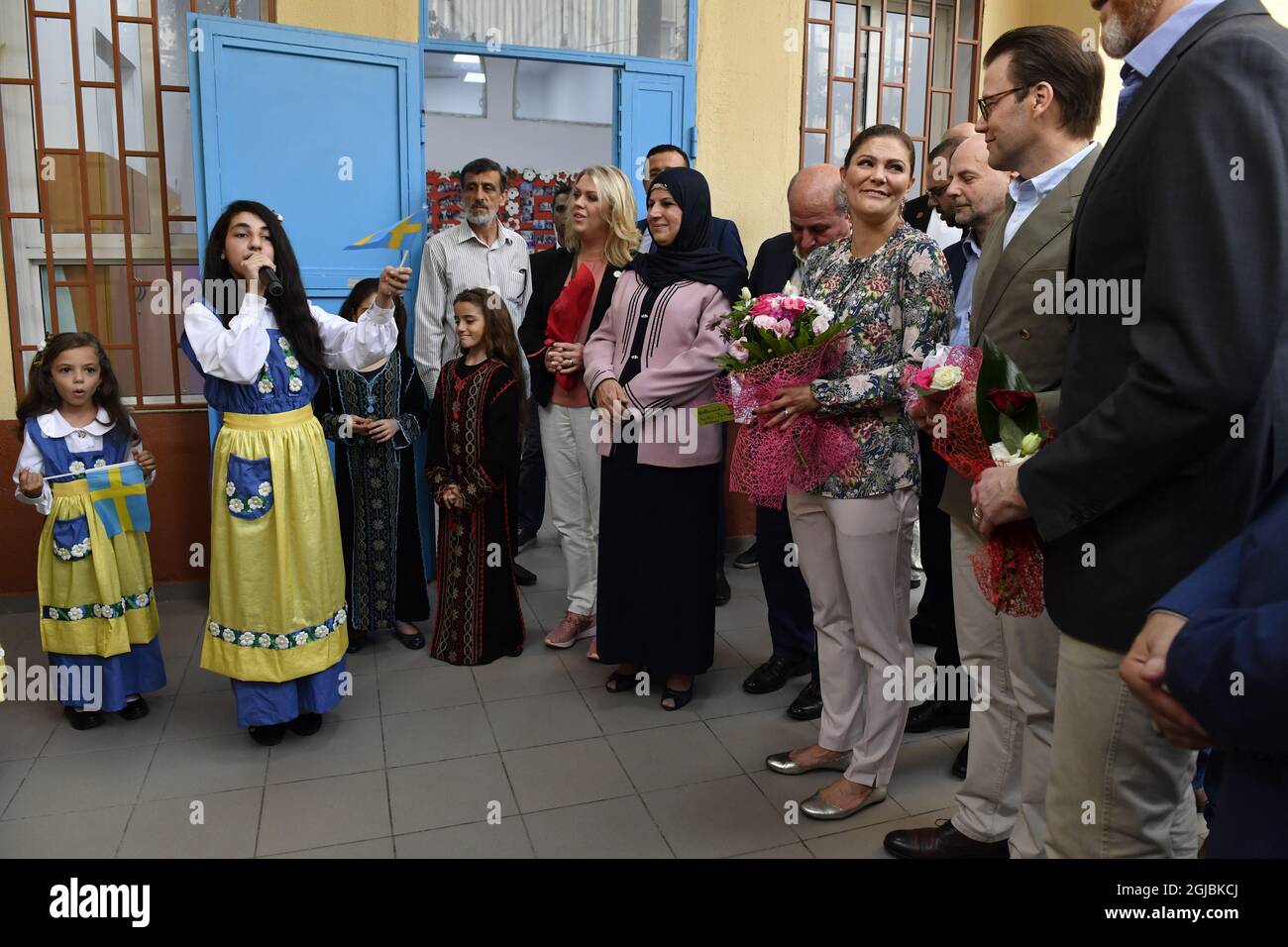 BEIRUT 20181018 Swedish Crown Princess Victoria, Prince Daniel and Minister Lena Hallengren during a visit to a girl school in Beirut, Lebanon on Thursday The students performed the national anthem of Sweden. The Crown Princess couple is on a five-day visit to Jordan and Libanon. Photo: Jonas Ekstromer / TT / code 10030  Stock Photo