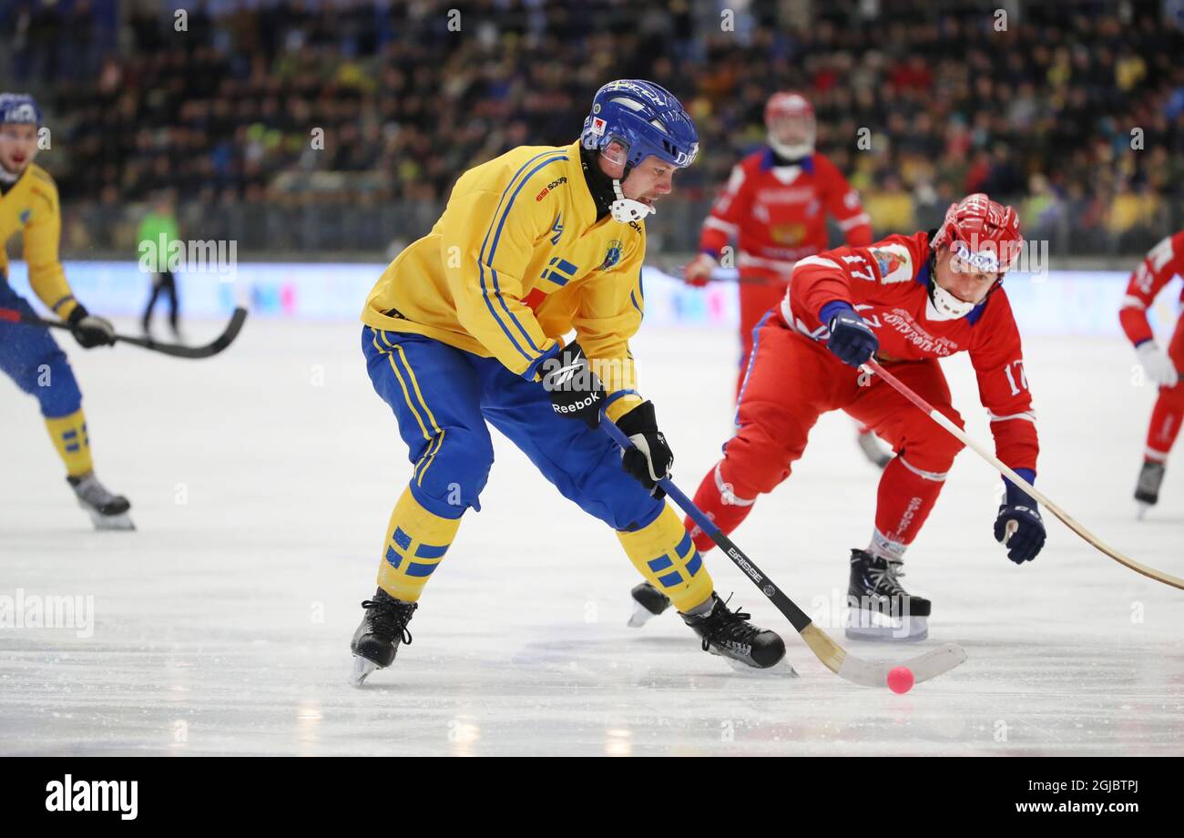 Sweden's Martin Johansson and Russia's Dmitry Savelyev during the Bandy  World Championship final match between Sweden