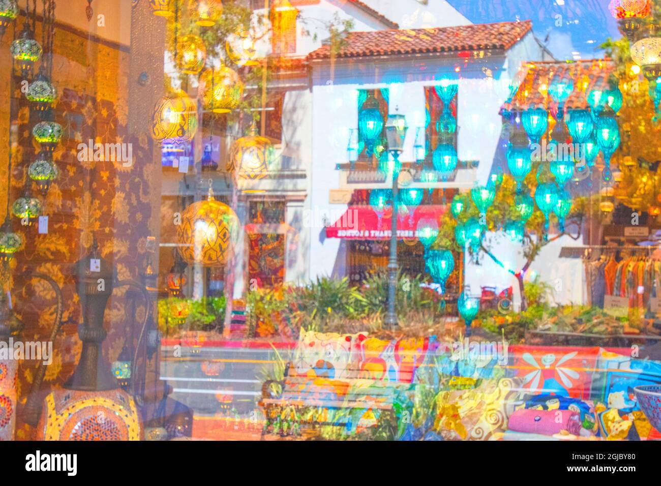 Reflection in downtown Santa Barbara of local storefronts Stock Photo