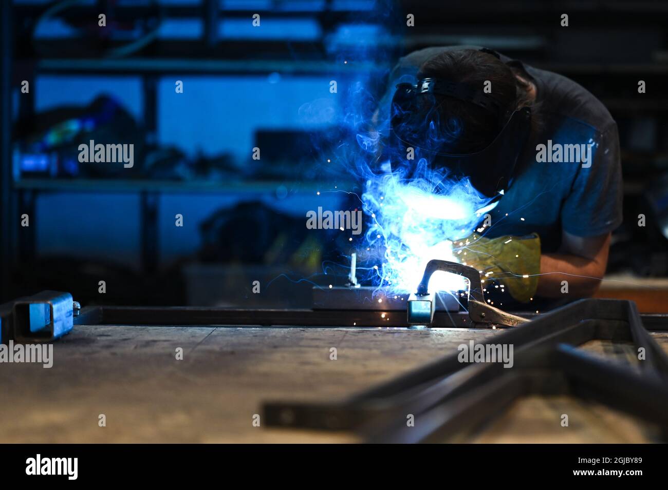 Welding with big sparks Stock Photo