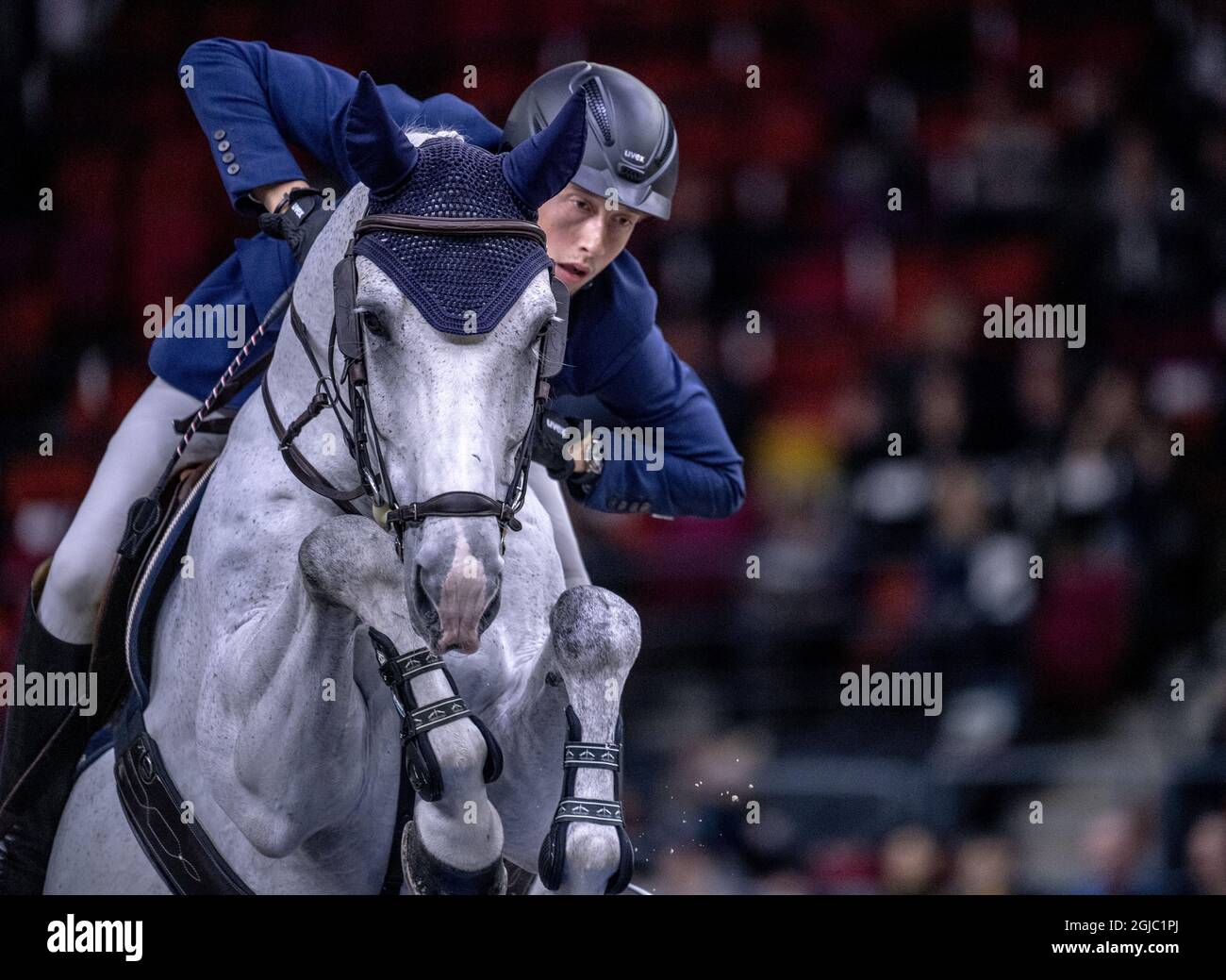 Martin Fuchs of Switzerland rides Clooney 51 during FEI World Cup final 1 show jumping event at Gothenburg Horse Show in Scandinavium Arena April 4, 2019. Photo Bjorn Larsson Rosvall / TT kod 9200 Stock Photo