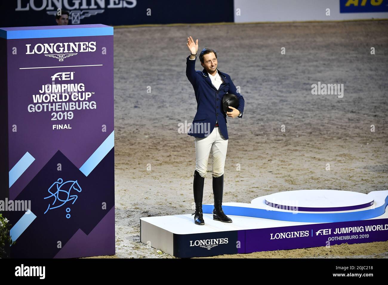 GOTHENBURG 20190407 From left Martin Fuchs of Switzerland on the podium after FEI World Cup final 3 show jumping event at Gothenburg Horse Show in Scandinavium Arena April 7, 2019. Photo Bjorn Larsson Rosvall / TT kod 9200  Stock Photo