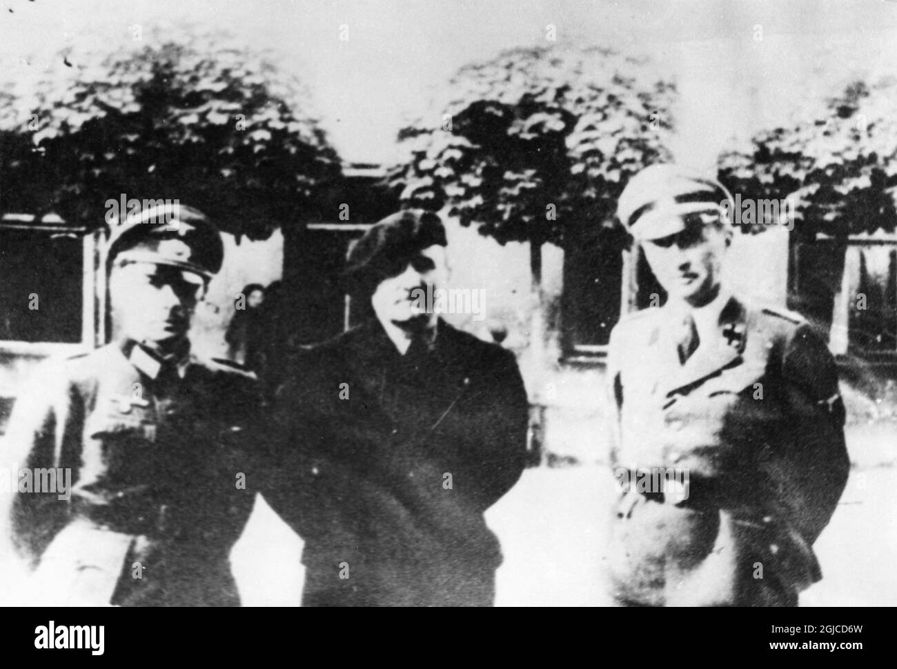 FRANCE 1944 Joseph Darnand, Secretary-General of the Vichy France militia and Secretary of State for maintenance of order during the last year of the Vichy regime, and a Major in the Waffen SS, flanked by German officers during the spring of 1944 in Vichy France.n. Photo: AB Text & Bilder / SVT / Kod: 5600  Stock Photo
