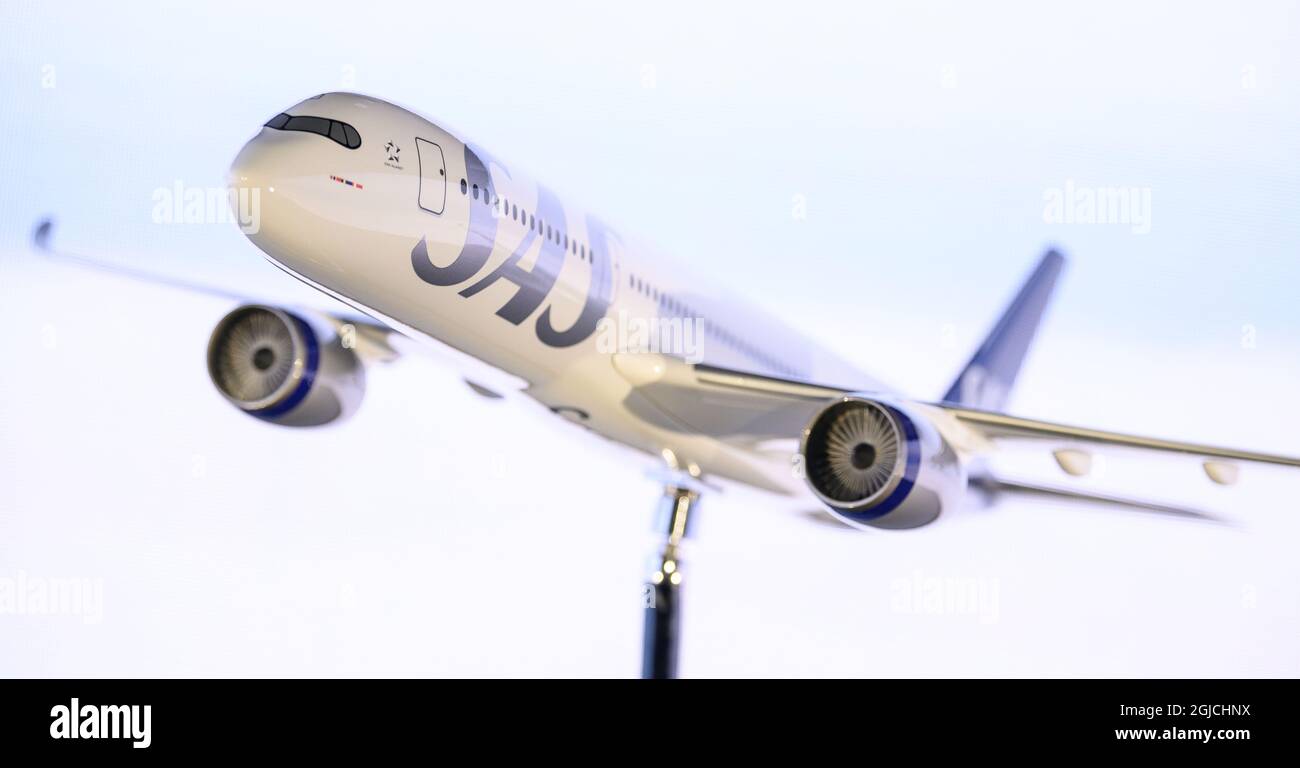 A model of an Airbus 350 with the airlines new logotype and colors ...