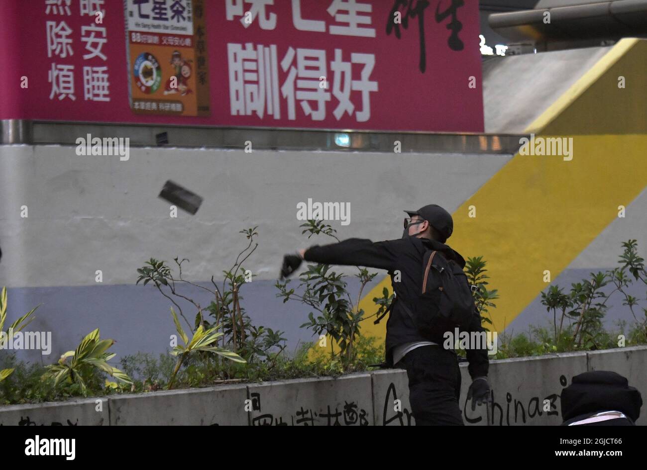 Police is shooting tear gas and protesters / students are throwing bricks, cobble stones and fire bombs during the riots in central Hong Kong in November 2019. Jerker Ivarsson/ Aftonbladet / TT code 2512 AFTONBLADET / 2826  Stock Photo