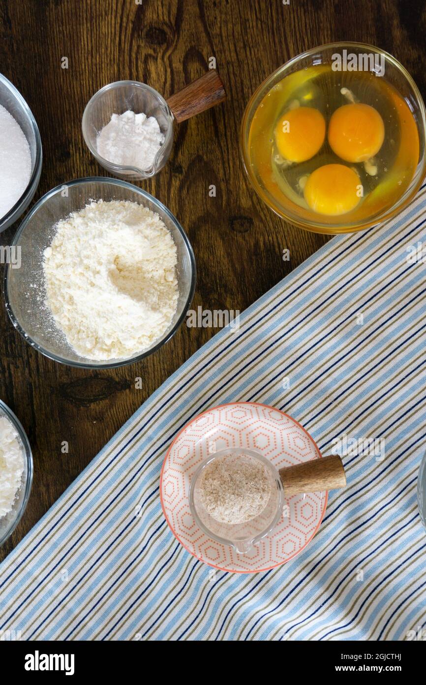 White gluten free pizza flour in wooden scoops Stock Photo Alamy