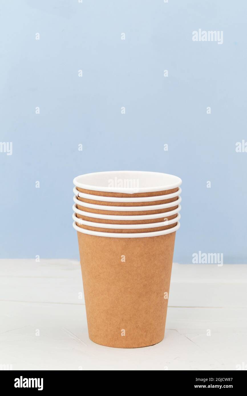 group of paper cups against blue background, greenwashing concept Stock ...