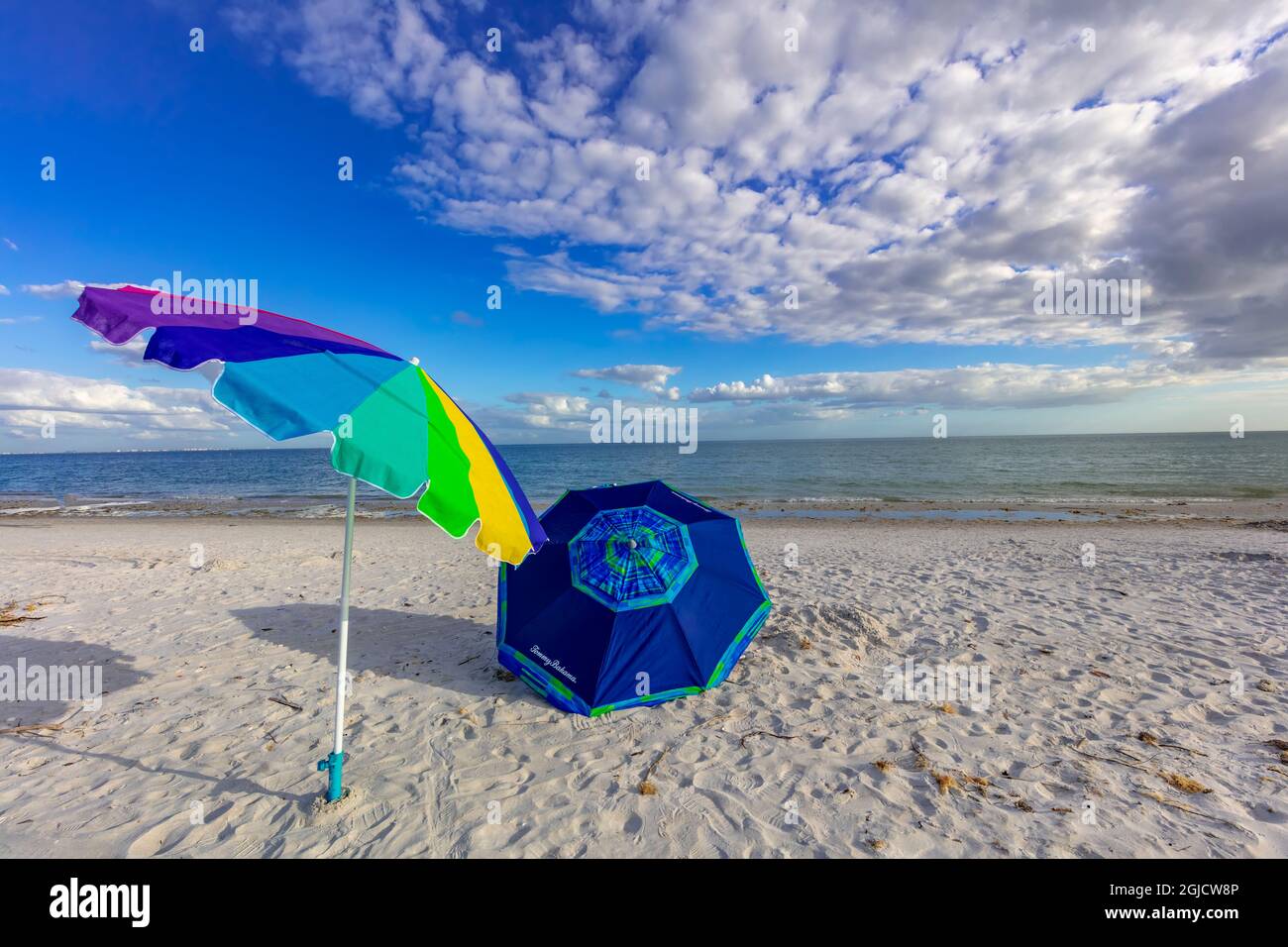 Umbrellas on an empty beach on Sanibel Island, Florida, USA Stock Photo