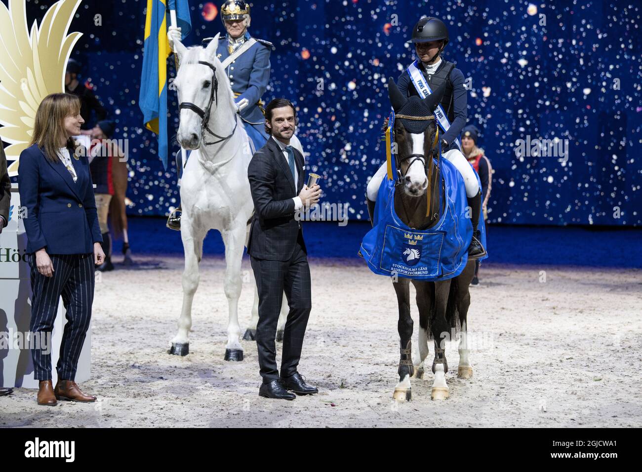 SOLNA 20191130 Swedens Prince Carl Philip awards Lilly Johansson, who won the Prince Carl Philips award at the Sweden International Horse Show in the Friends arena in Solna. Foto: Jessica Gow / TT kod 10070  Stock Photo