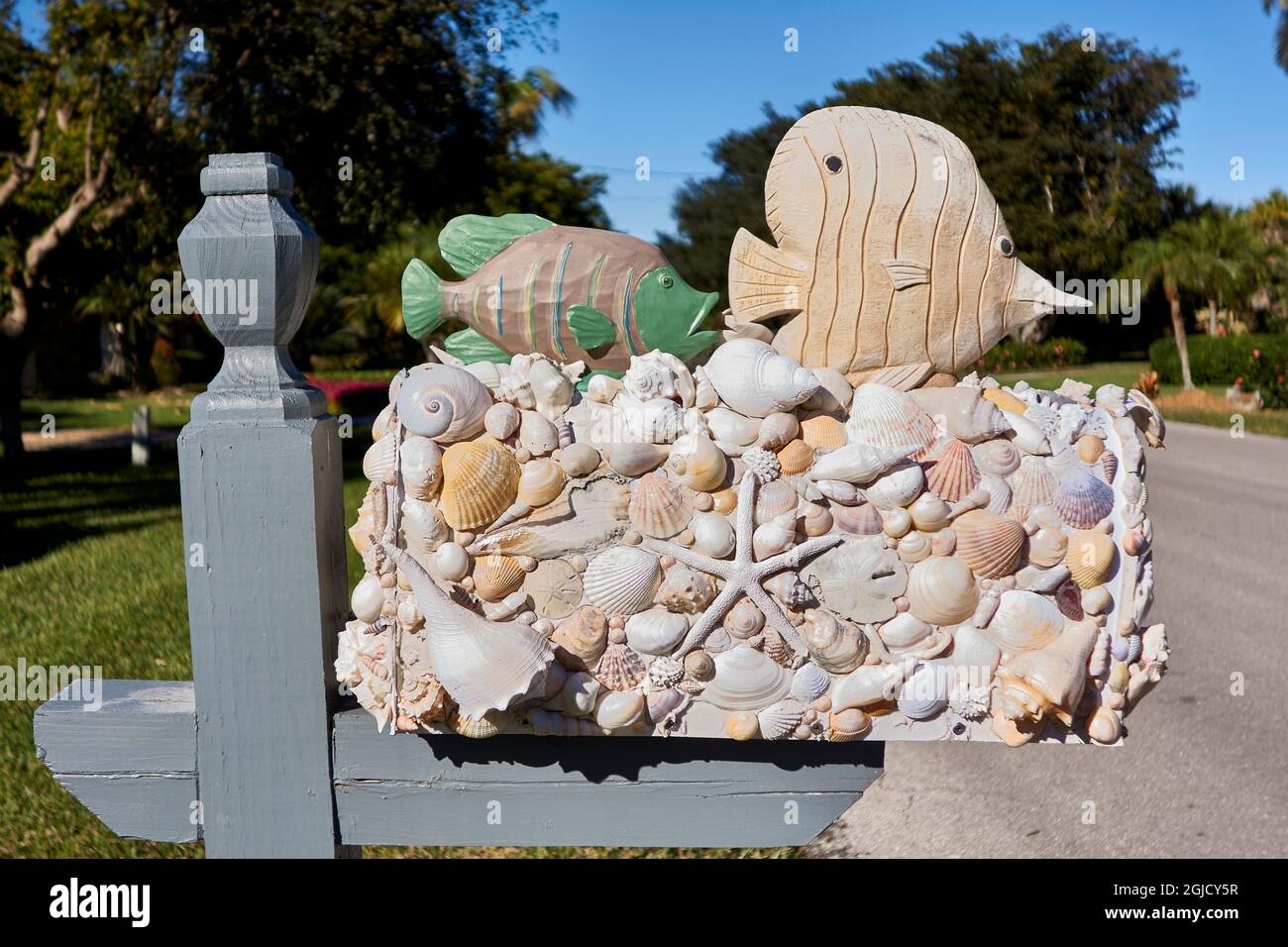 USA, Florida, Sanibel Island. Sanibel shell mailbox. Sanibel is a barrier island known for beach shelling and the Ding Darling National Wildlife Refug Stock Photo