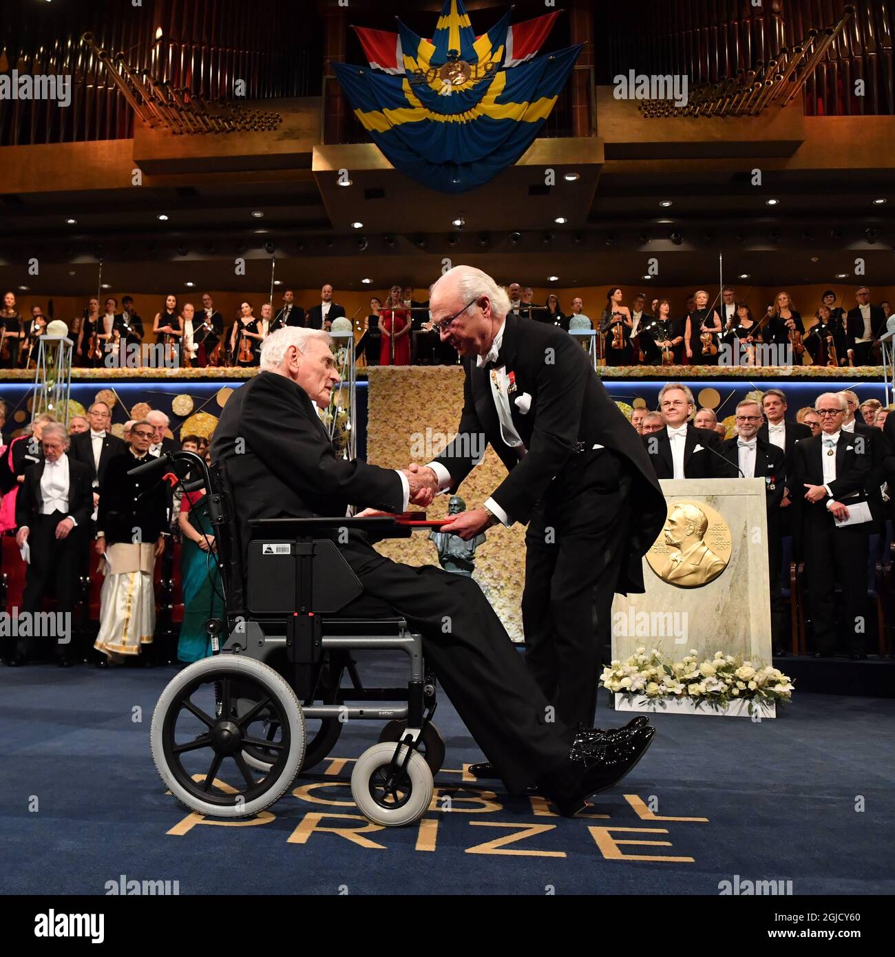 Chemistry Laureate John B. Goodenough, Left, Receives The Prize From ...