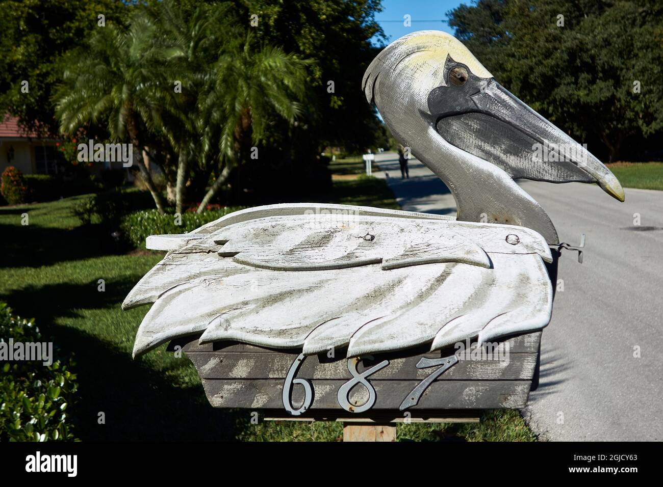 USA, Florida, Sanibel Island. Hand carved pelican mailbox. Sanibel is a barrier island known for beach shelling and the Ding Darling National Wildlife Stock Photo
