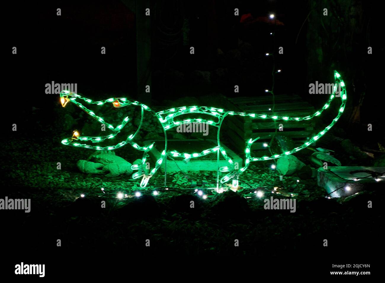 USA, Florida, Sanibel Island. Alligator Christmas lawn display. Sanibel is a barrier island known for beach shelling and the Ding Darling National Wil Stock Photo