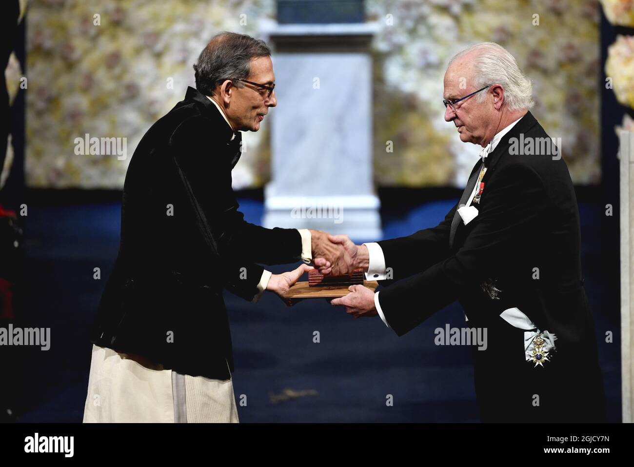 Abhijit Banerjee Of India Left Receives The Sveriges Riksbank Prize In Economic Sciences In