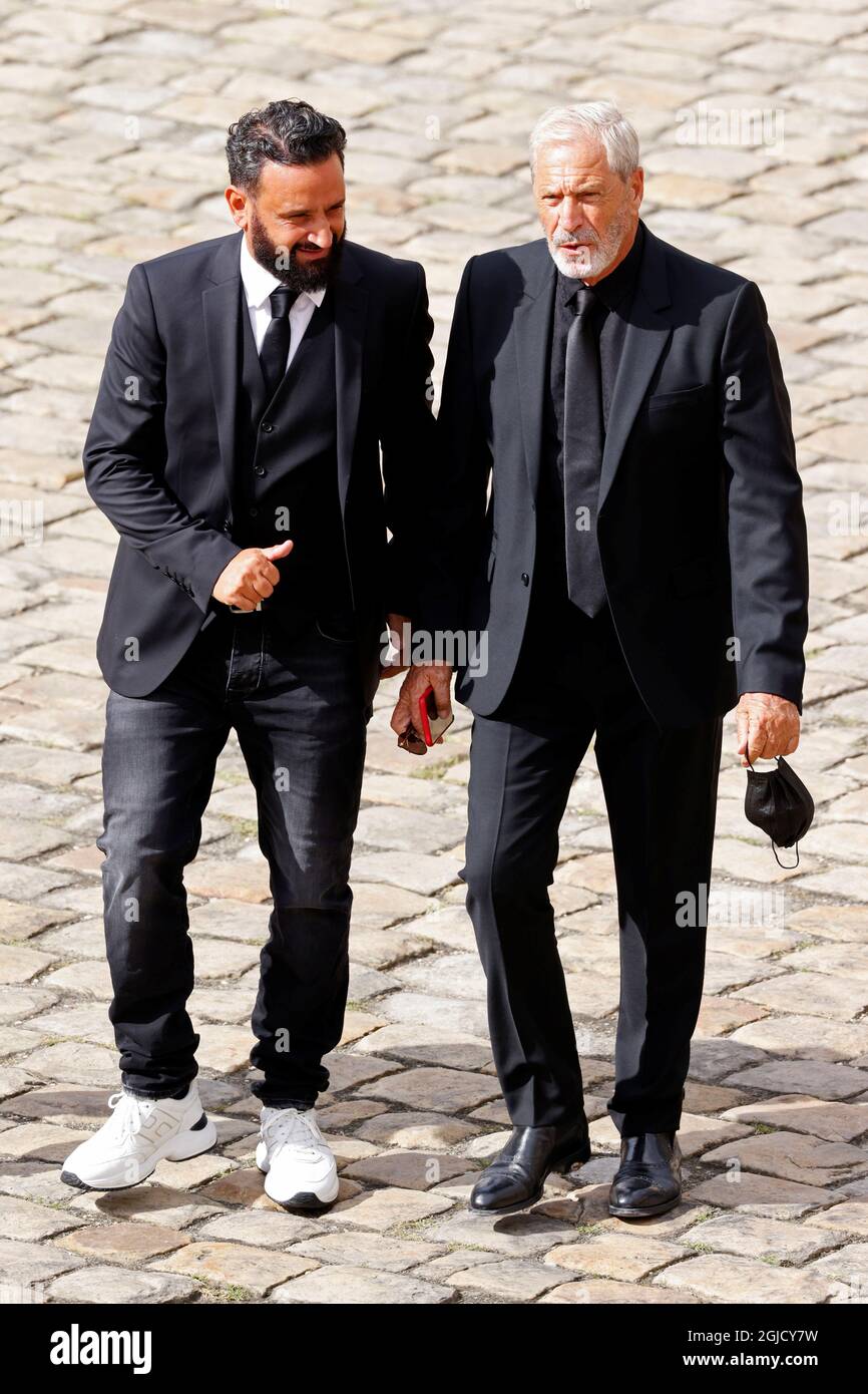 Cyril Hanouna and Jean-Claude Darmon arrive to attend a national tribute  for late actor Jean-Paul Belmondo during a ceremony at the Hotel des  Invalides in Paris, France, September 9, 2021. REUTERS/Eric Gaillard