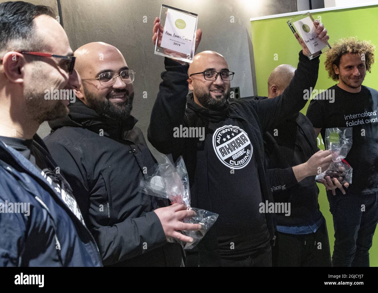 The world's best falafel is still Danish. Ali Abdullah (middle) at Danish Ahaaa Arabic Cuisine won the Best Falafel and Most Innovative Falafel categories. Fifteen teams from six countries competed at the International Falafel Award 2019 in Malmoe, Sweden on Saturday December 14, 2019. Photo: Johan Nilsson / TT / code 50090 Stock Photo