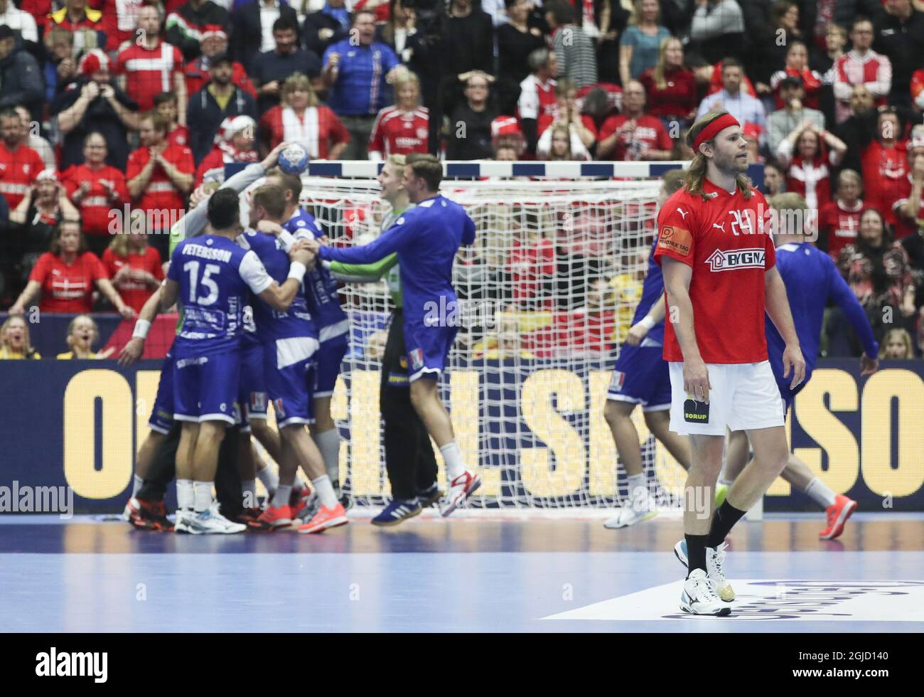 MALMO 20200111 Players of Iceland celebrate their wictory Mikkel Hansen dejected (R) during the Men's EHF EURO 2020 Handball group E match preliminary round between Denmark and Iceland in Malmo Arena