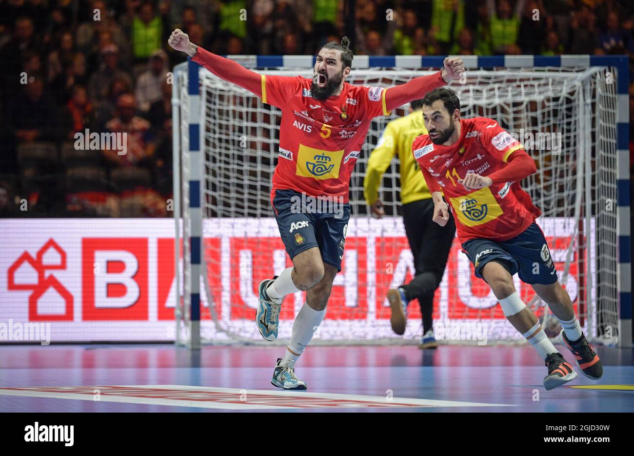 Spain's Jorge Maqueda Pena celebrates a goal with Daniel Sarmiento Melian  during the Men's European Handball Championship final match between Spain  and Croatia in Stockholm, Sweden, on Jan. 26, 2020. Photo: Anders