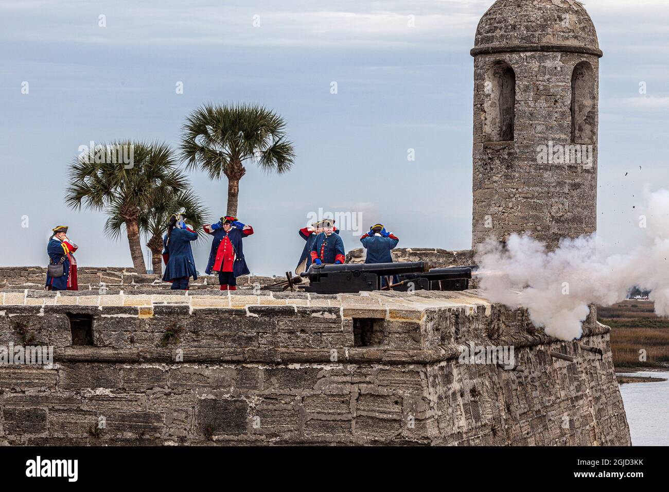 A cannon fires from the Spanish fort, Castillo De San Marcos, in St ...
