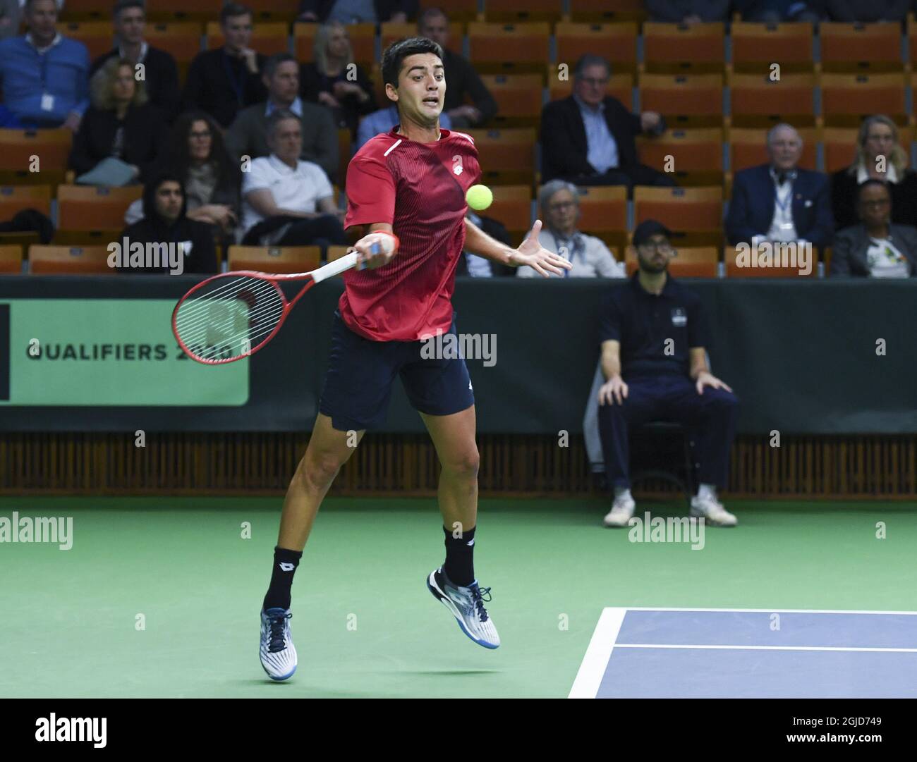STOCKHOLM 20200306 Chile's Marcelo Tomas Barrios Vera returns to Sweden's Mikael Ymer during qualifying game for the Davis Cup playoff between Sweden and Chile in the Royal Tennis Hall in Stockholm on March 6, 2020. Photo Erik Simander / TT kod 11720 Stock Photo