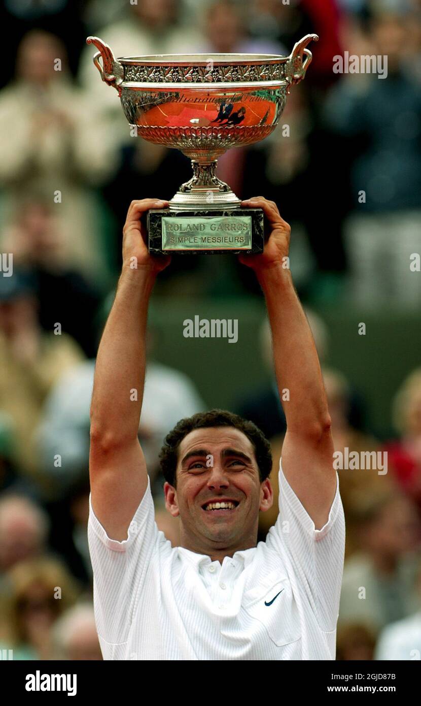 Alberto Costa of Spain celebrates with the French Open trophy after his victory over compatriot Juan Carlos Ferrero  Stock Photo