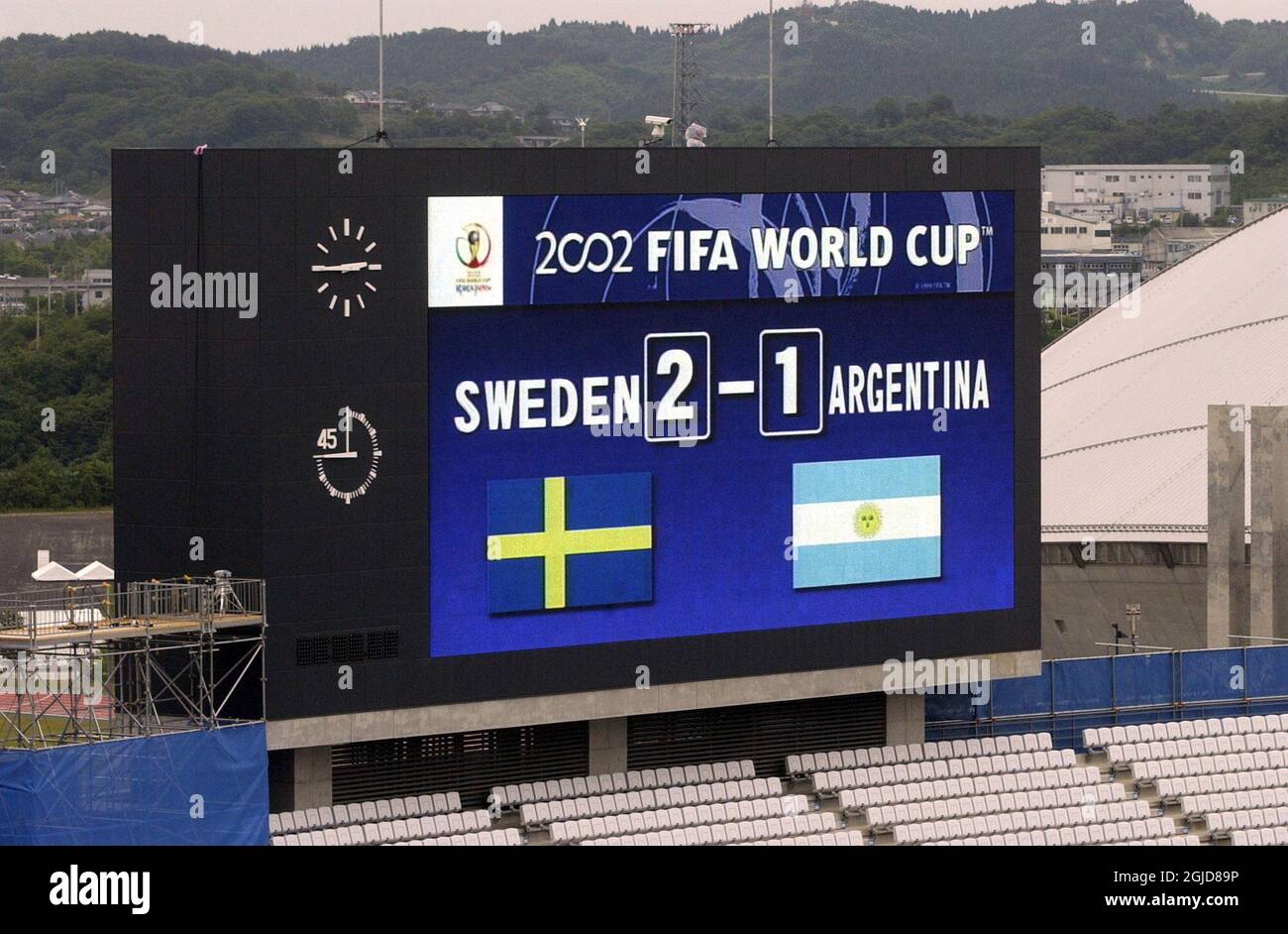 Testing of the scoreboard as preperations are underway for the forth coming Argentina-Sweden game at Miyagi Stadium Stock Photo