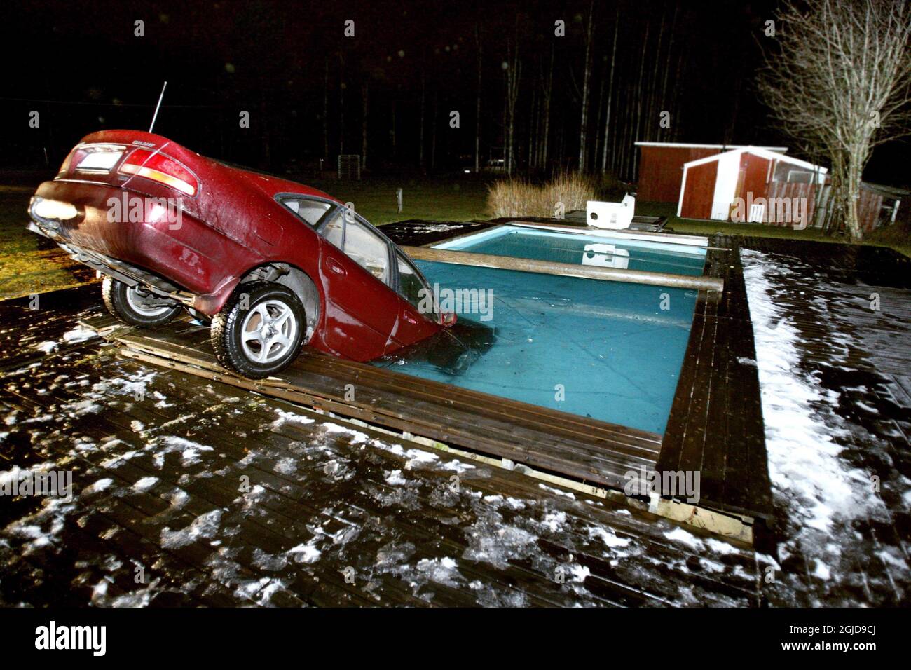 Married couple Bo Lundgren and Mona Backman had a surprise waiting when they arrived to their home  in the village of Ojebyn, north Sweden late the  evening of November 6, 2007 . The driver of a car had became  unconscious and his his car ended up in the pool.       Stock Photo