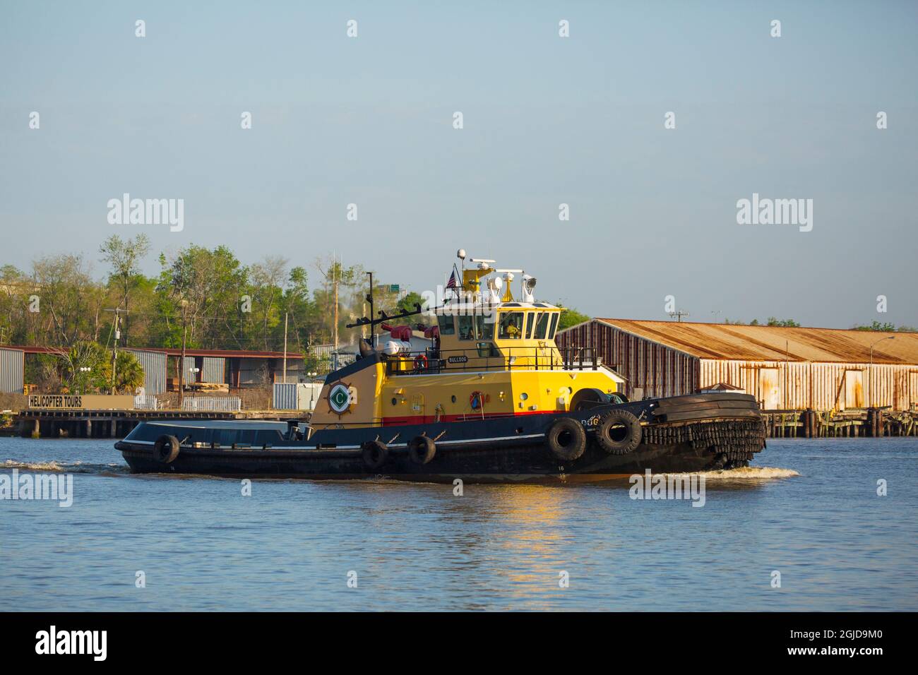 USA, Georgia, Savannah. Tugboat leaving Savannah Port. Stock Photo