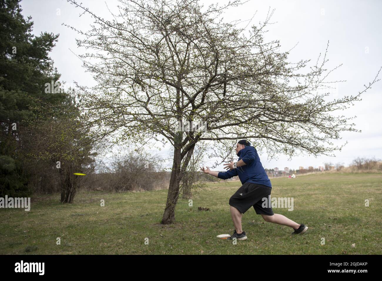 STOCKHOLM 20200411 People playing Disc golf at Jarva Discgolfpark, in ...