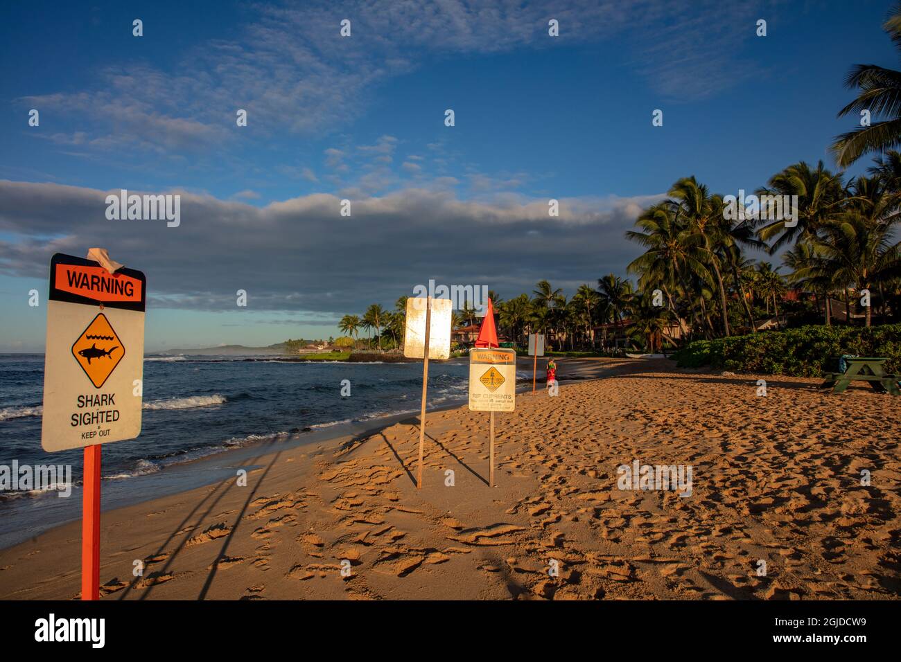 Warning signs at Poipu Beach in Kauai, Hawaii, USA Stock Photo