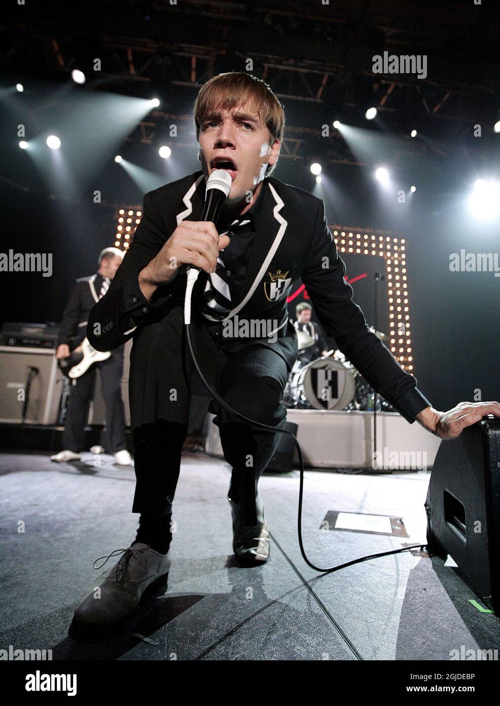 Pelle Almqvist, frontman in the Swedish rock band The Hives performs during a concert in Stockholm, Sweden. Stock Photo