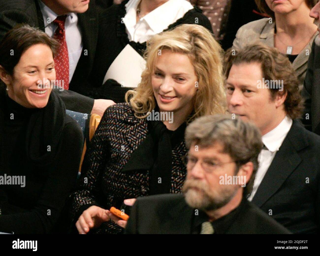 Actress Uma Thurman, host of the Nobel Concert, in the audience and her boyfriend multi billionaire Arpad Busson during the Nobel Peace prize award in the City Hall of Oslo, Norway. Stock Photo