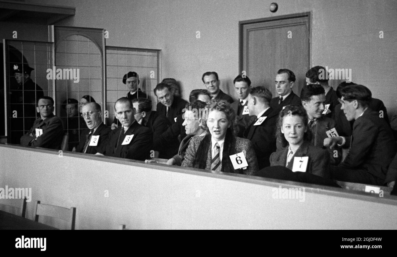 Gestapo informer Henry Rinnan (left, first row) and co- defendants during the trial in Trondheim, Norway, April 30, 1946. Stock Photo