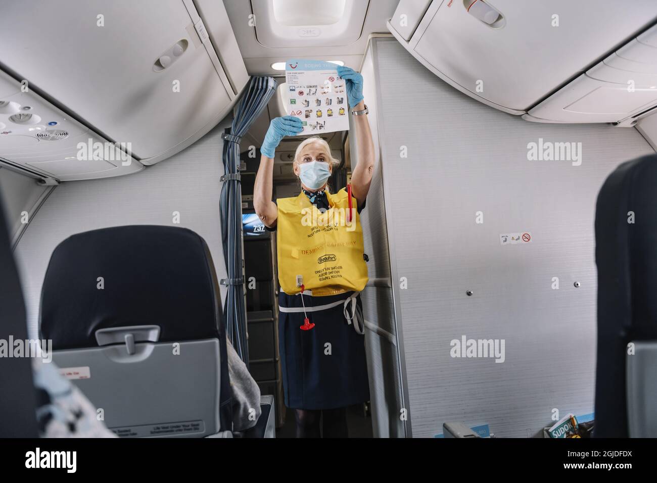 Flight attendant safety demonstration hires stock photography and images Alamy