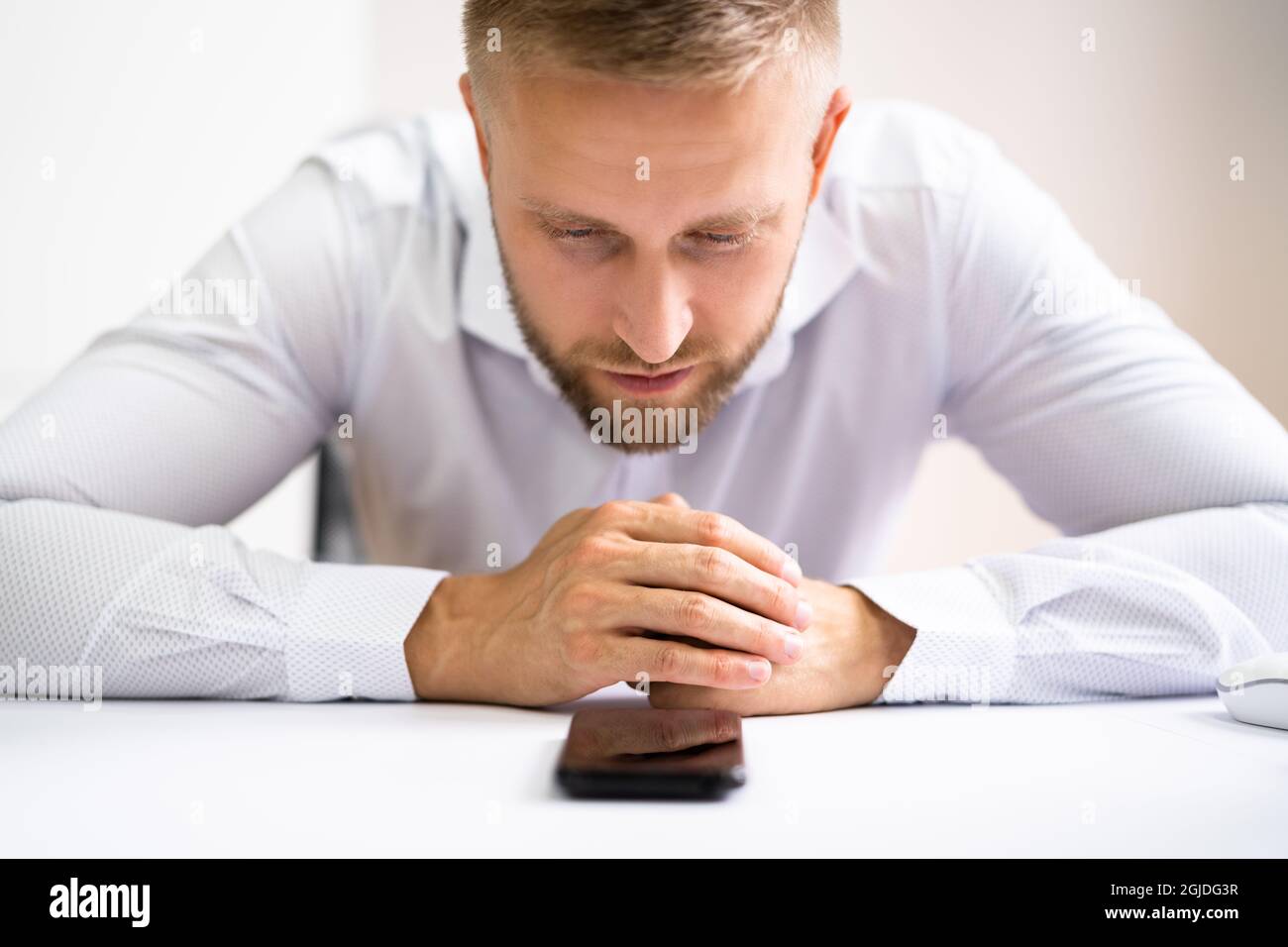 Man Waiting Phone Call At Office Desk Stock Photo Alamy