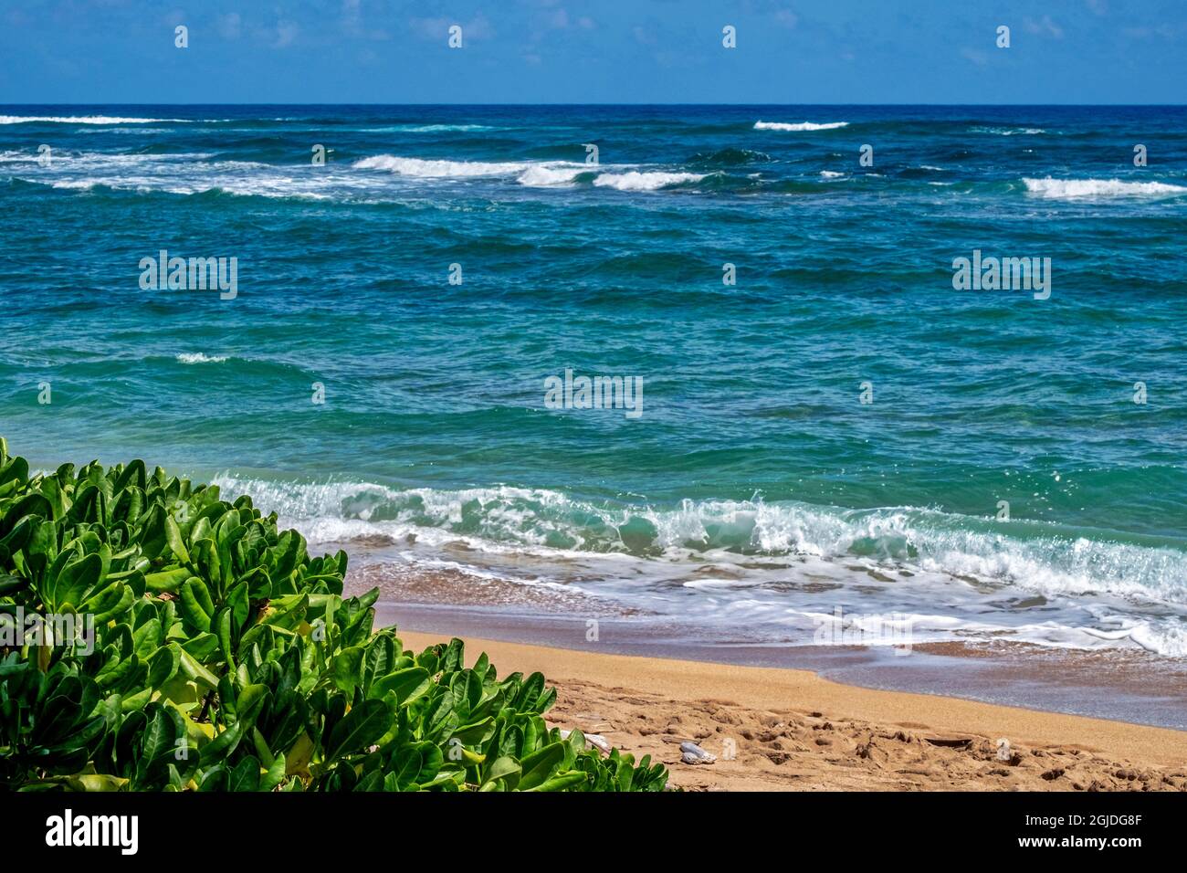 Waves crashing on Poipu beach, Kauai, Hawaii, USA Stock Photo Alamy