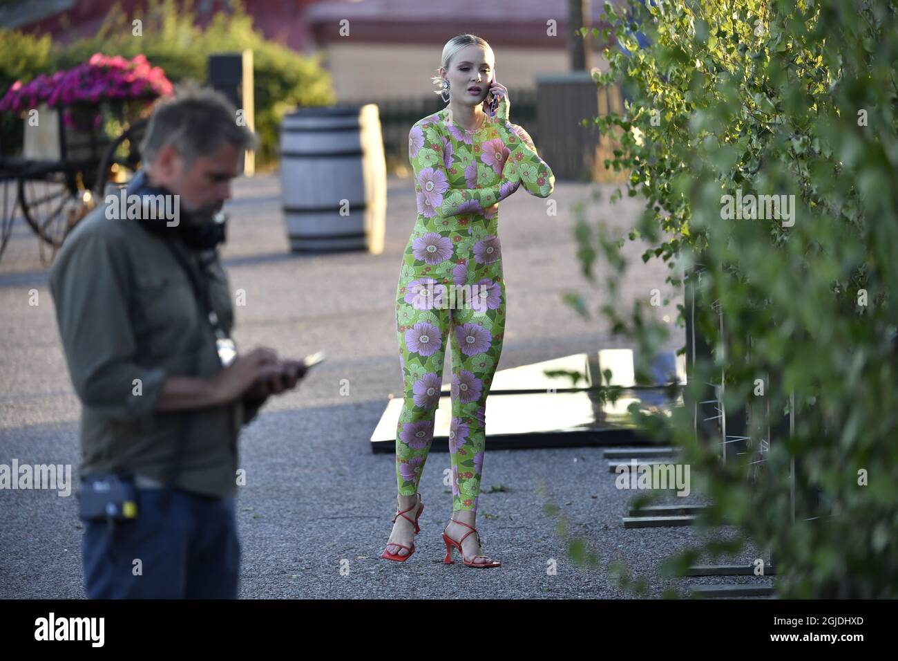 Zara Larsson on the phone before going on stage for her performance at  Allsang pa Skansen in Stockholm, Sweden, August 11, 2020. Photo: Anders  Wiklund / TT / code 10040 Stock Photo - Alamy