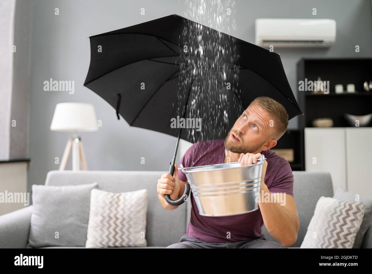 Emergency Leak In House Or Apartment. Water Falling From Ceiling Stock