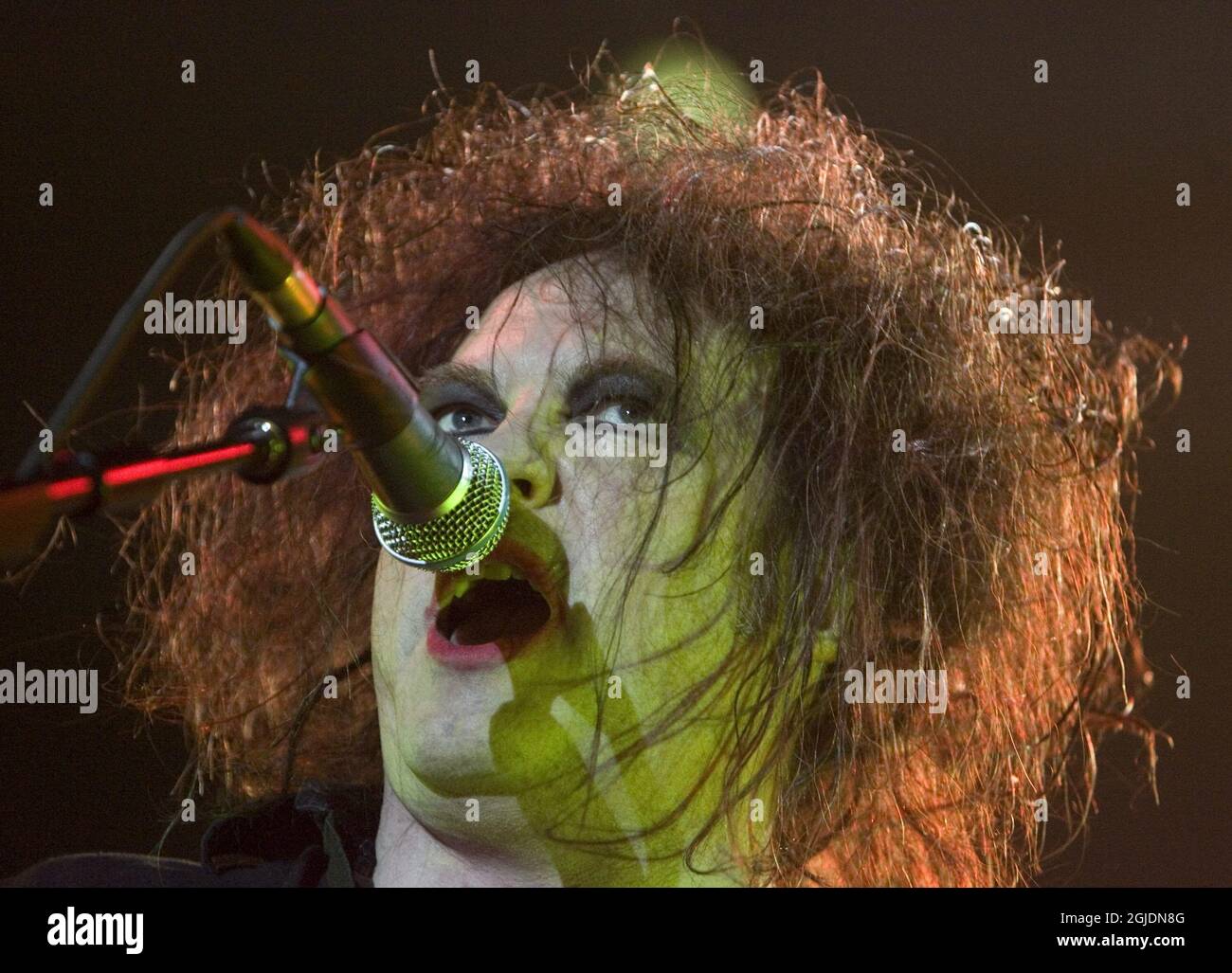 Robert Smith performing during "The Cure" concert in Stockholm, Sweden. Stock Photo